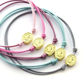 PACK de 5 pulseras San Benito dorado pastel